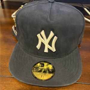 New Era Black Cap with White and Blue Embroidery